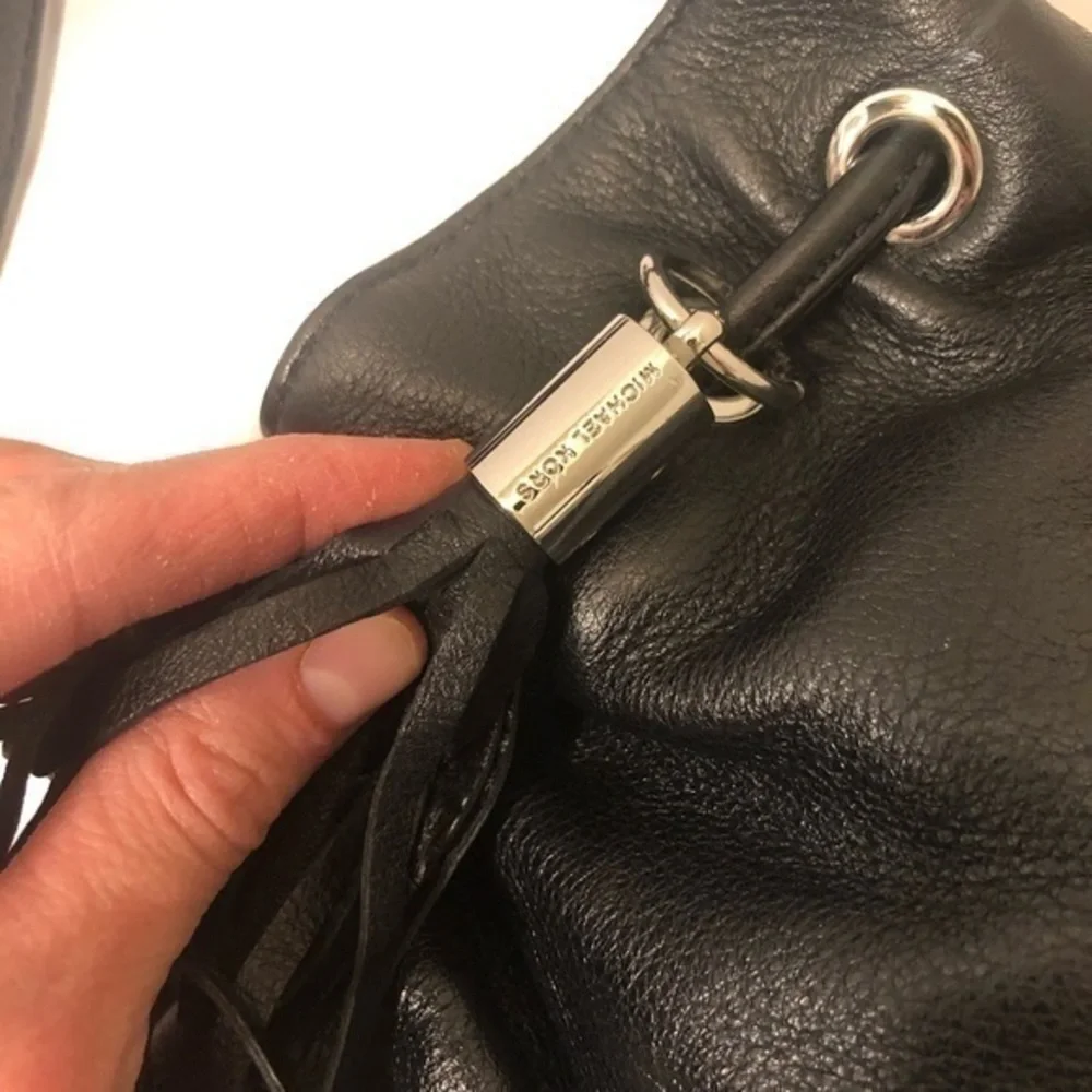 Michael kors black leather tassel crossbody bag